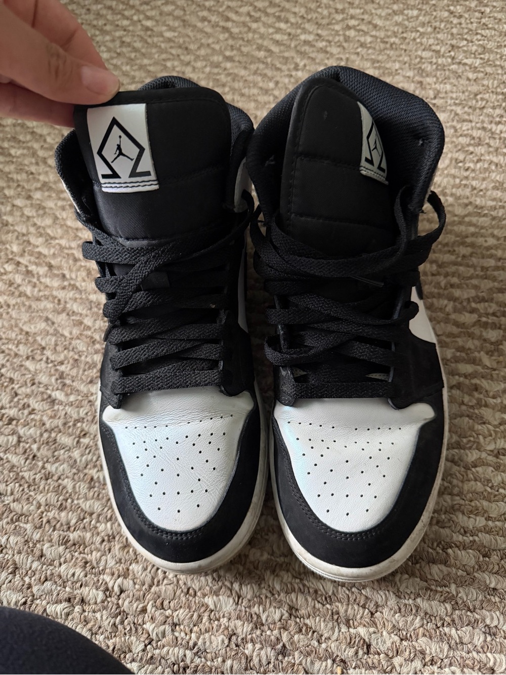 Jordan Black and White Retro High-Top Sneakers